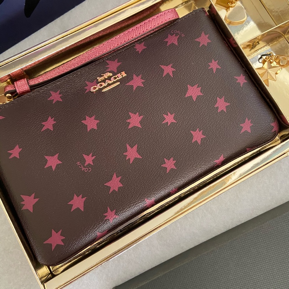 COACH BOXED LARGE WRISTLET STAR PRINT AND CHARMS
